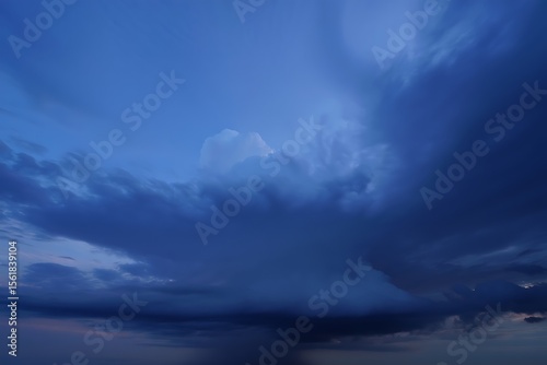 Deep blue storm clouds gathering in the sky dark