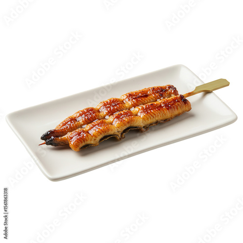 Grilled Unagi Kabayaki Skewers with Sweet Soy Glaze on a Rectangular Plate