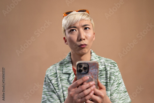 Contemplating While Holding Phone