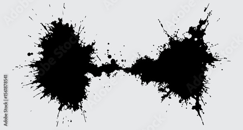 Black Ink Splatter: Abstract art of black ink splatter, perfect for design projects needing a bold and dramatic touch.