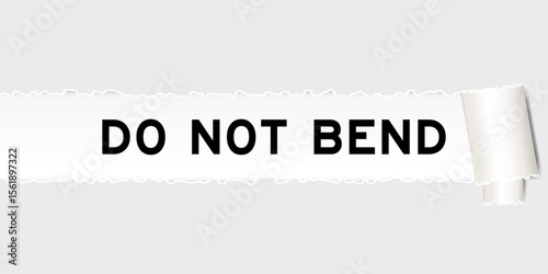 Ripped gray paper background that have word do not bend under torn part