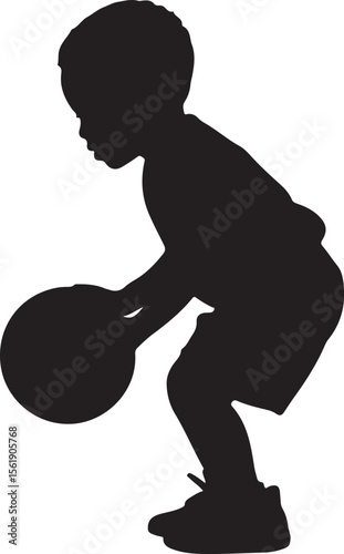 Young boy in silhouette holding a basketball in a playful stance