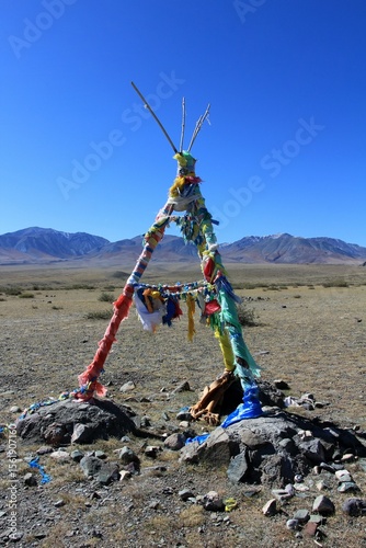 An example of an obo in Mongolia. A sacred ovo dedicated to the mountain spirit. A votive offering corner in shamanism.