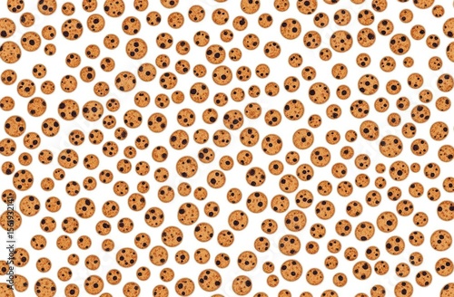 Scattered round cookies on white background