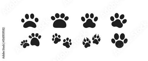 Black animal paw print vector set. Pet footprint icons in silhouette style, perfect for dog, cat, puppy, pet care, vet clinic, adoption, and animal-related graphic design projects.