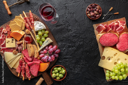 Wallpaper Mural Antipasti or tapas banner design. Charcuterie and cheese board with wine, shot from the top with copy space Torontodigital.ca
