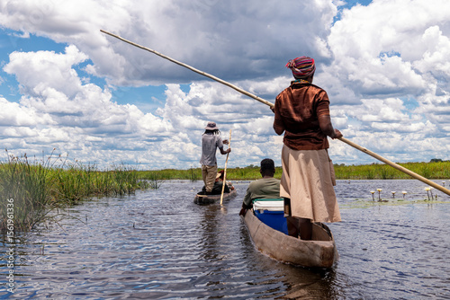 On the way in a dugout canoe through the Okavango Delta, Botswana