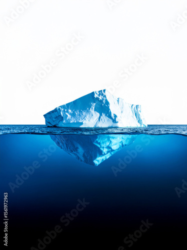 Wide Iceberg Floating in Cold Ocean Under Blue Sky – Landscape View Representing Hidden Depth, Nature’s Strength, and Arctic Serenity