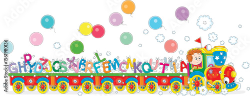 Little boy driving a colorful toy train carrying funny letters of English alphabet, vector cartoon illustration on a white background