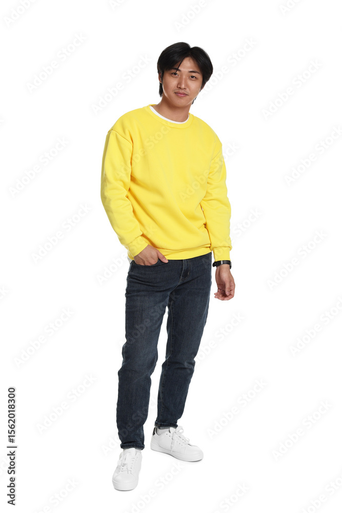 Fototapeta premium Handsome Asian man posing on white background