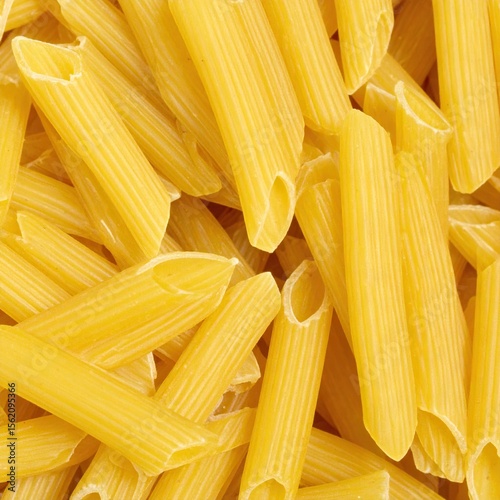 Penne Pasta Background with Food Texture, and Italian Cuisine.
