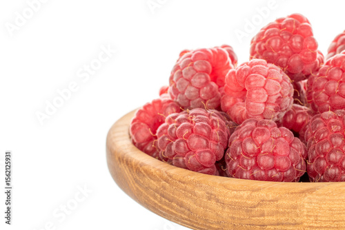 Fresh sweet raspberries isolated on white background, macro.