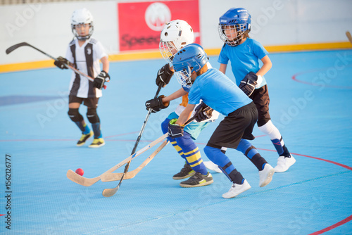 Photography Team players having competitive hockey game