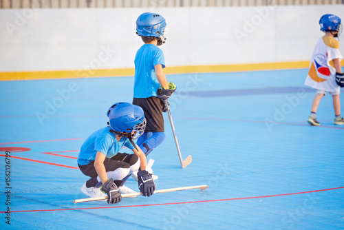 Photography Team players having competitive hockey game