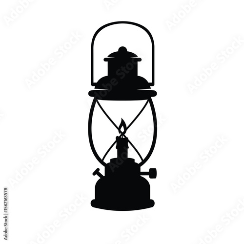 Old rustic metal kerosene lantern with a glass chimney, an antique isolated object for vintage lighting