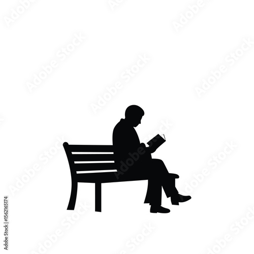 Silhouette of a person seated on a bench with a book