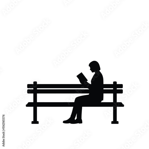 A woman reading book silhouette