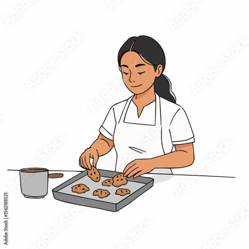 Hispanic woman placing cookies onto baking tray in kitchen  