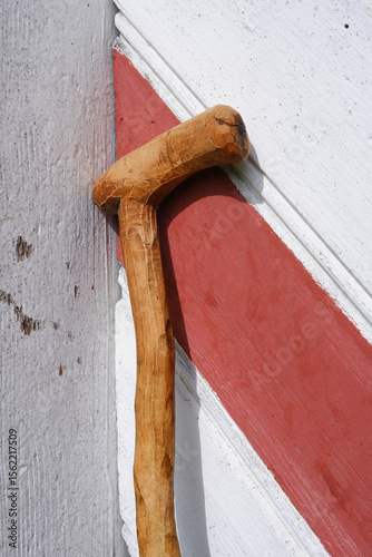 a self-made walking stick by the door