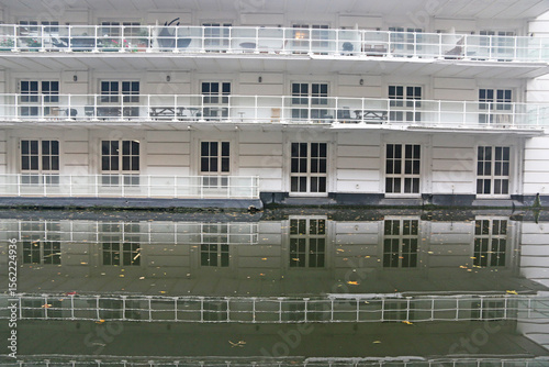 Building reflected in a canal