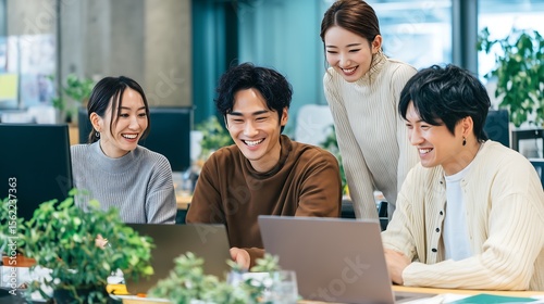 Young Professionals Sharing Laughter in Team Workspace. Generative AI