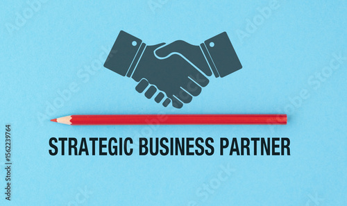A red pencil is next to a handshake symbol. The text reads Strategic Business Partner.