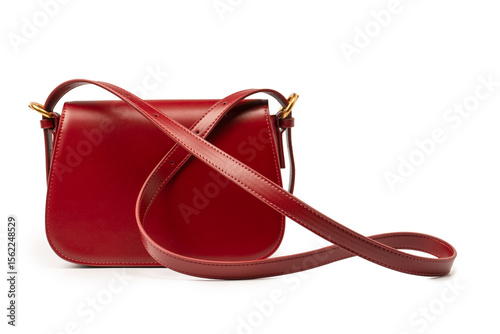 Burgundy shoulder leather bag isolated on white background.