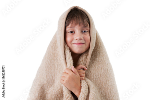 Girl is basking under a woolen blanket.