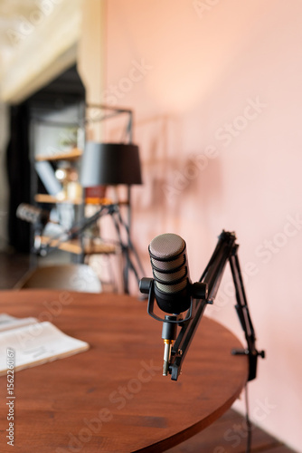 Podcast recording setup featuring a professional microphone and comfortable workspace for engaging conversations