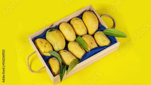 Chaunsa Mango wooden baset on yellow video 4k