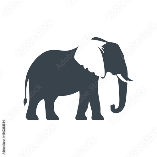 Silhouette of an elephant standing gracefully against a plain background, symbolizing wildlife