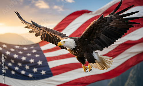 Bald eagle flying above american flag