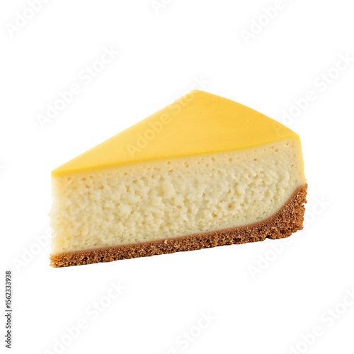 Slice of creamy cheesecake with yellow topping on white background and copy space
