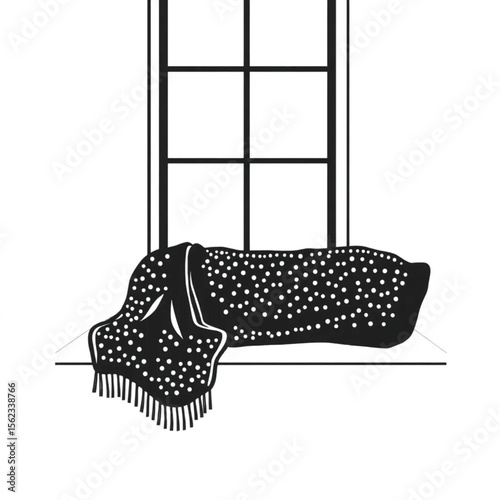 A woollen throw on a window seat