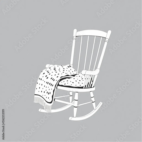 A woollen throw on a rocking chair