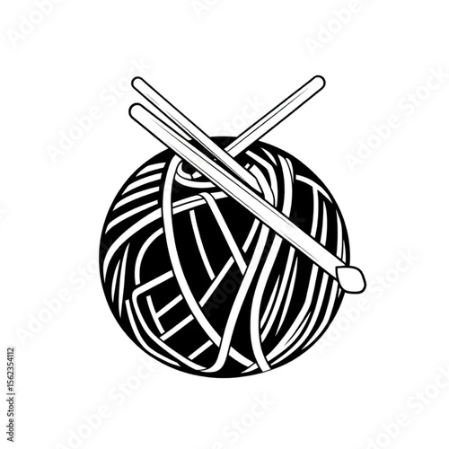 A pair of knitting needles in a ball of yarn