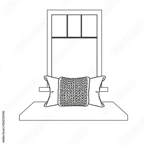 A knitted cushion on a window seat
