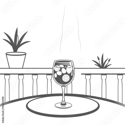 A glass pitcher of sangria on a terrace table