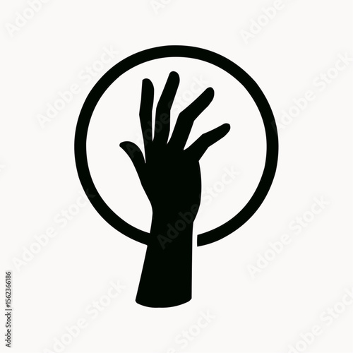 Silhouette of a hand holding a peace symbol