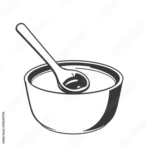 A wooden ladle in a soup pot