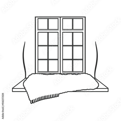 A woollen throw on a window seat