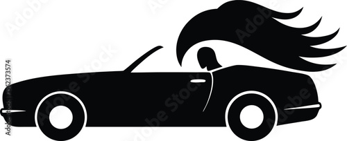 Silhouette of a woman driving a convertible car with flowing hair