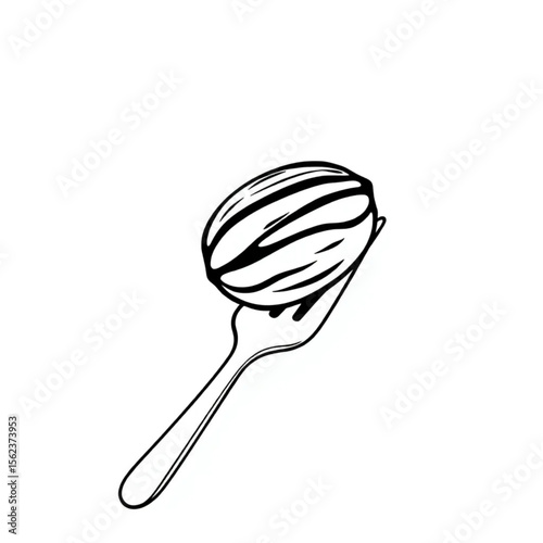 A single pecan on a dessert fork