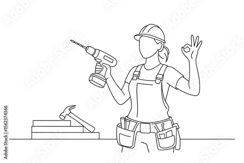 A person in a construction outfit holds a cordless drill in one hand and makes an OK gesture with the other