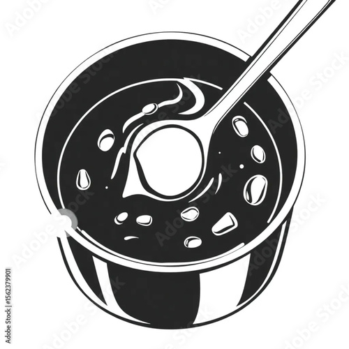 A wooden spoon in a stew pot