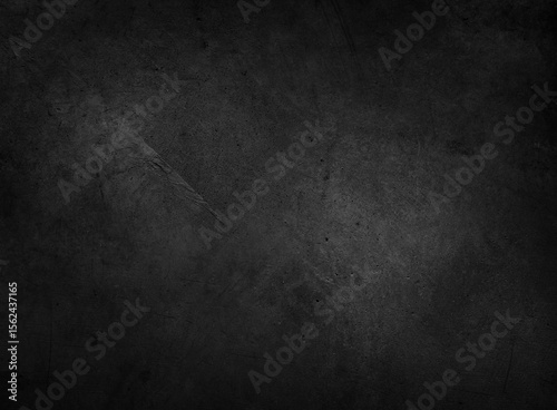 Dark grey textured concrete grunge wall background