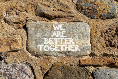 We are better together symbol. Concept words phrase We are better together on beautiful grey stone wall. Beautiful stone wall background. Business We are better together concept. Copy space.