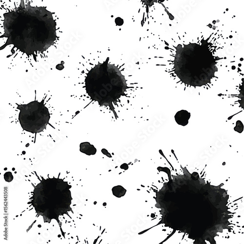 Ink splatters and drips creating a seamless black and white pattern