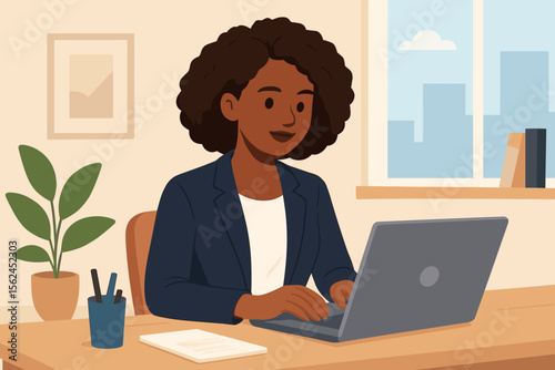 African American businesswoman working on a laptop in a modern office setting. Black female professional, manager or freelancer typing at computer desk. Corporate career concept.