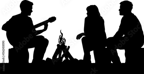People gathered around a campfire playing guitar silhouette